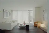 The minimalist residence was converted from a mattress factory about 30 years ago.
