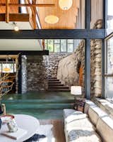 The front door opens to the step-down living room.