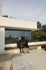 Jinnie and Wook play with their dog, Agi.