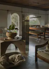 Exposed electrical conduits combined with concrete floors lend a rough and ready feel to the home.