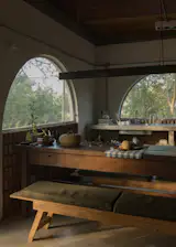 The kitchen walls are clad in brick set at an angle, a theme for the renovation.