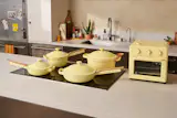 Our Place’s cookware in Butter Yellow