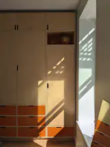 Instead of hardware for pulls, Andrew made cutouts in the cabinetry.