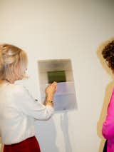 Danish textile artist Margrethe Odgaard assembles her wallhanging pieces by overlaying layers of printed silk organza.