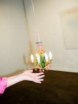 Artist Urs Fischer makes precious chandeliers from Murano glass.