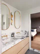 Brianna calls the new primary bathroom “Daniel’s oasis.”