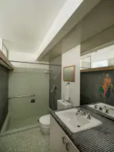 Robert was an engineer, and Elsa was an artist—her mosaic work is still visible in the house today.&nbsp;