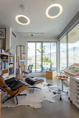 The interior decor also plays up the home’s midcentury vibe.