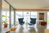 Six-foot cantilevered overhangs prevent the summer sun from hitting the home’s triple-glazed windows directly. Polished concrete floors with in-slab heat also help ensure the home stays comfortable year-round.