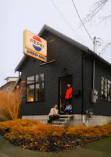 The family spent $2,400 on landscape design to transform the sloped site into terraces where Hiro plays soccer and creates potions.