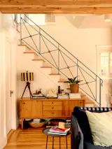 The Siegel Buffet credenza is from West Elm, and the Neva sofa is from Six Penny.
