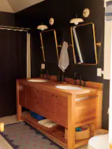 With the new primary suite, the family of four no longer has to share the ground floor bathroom, just off the living space.