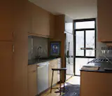 Jeff led the design process, but the kitchen is Kim’s domain, with plenty of storage for the ceramics the couple has collected on their travels around the world.