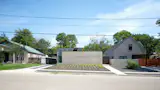 Ibañez Shaw Architecture designed a family home for the founders of Melt Ice Creams, Kari and Mark Seher, that splits the depth of its lot into indoor and outdoor areas.