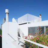 The rooftop deck offers panoramic views of the neighborhood. The couple have not furnished the deck because it gets very windy.