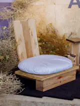 Untildef Studio x Studio Anand Sheth, Nomad Chair made from OSB, with sawdust-filled cushion. 
