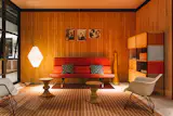 Much of the furniture the Eameses produced was designed to be modular, from their storage unit’s transmutable panels to the molded plastic chair with swappable legs. Seeing the familiar pieces in the living space drove home the throughline of modularity.