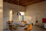 A low-set picture window in the living space opens up the room while maintaining privacy.
