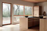 The cabinetry in the kitchen is crafted from rift-sawn white oak and was built by homeowner Oliver. 