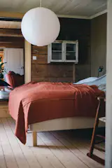 Friso and Mare’s bedroom is tucked away upstairs, accessed from the living area.