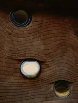 Stained-glass windows by Handelman that look like eyes give the home a sentience.