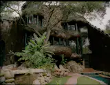 Carmichael designed the home around the property’s oak trees. The Raabs have relandscaped the yard to include grass and native and edible plantings.