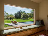 Campbell added a large picture window and a sun bench off the dining area.