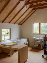 The illegal ADU above the garage is now a studio space and guest accommodation.