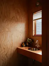 Campbell included a powder room and two closets in the foyer.