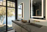 Durability was a major consideration when selecting the home’s windows, particularly in a climate like Minnesota, where glass is exposed to dramatic temperature fluctuations, as well as snow, wind, and humidity. CLiC smart glass blocks 99.9% of UV rays and features a multi-ply laminated construction engineered to withstand extreme conditions.