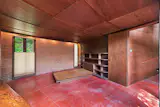 The house has a ramp to the upper floor, rather than stairs.