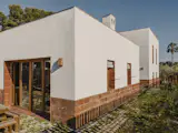 On Spain’s Costa Daurada, Slow Studio used passive design principles to create an efficient, flexible family home for Guillem and Arantza Pujadas.