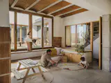 Slow Studio used passive design principles to craft a flexible home with a thriving garden on a tricky L-shaped lot overlooking Spain’s Costa Daurada.
