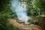 The cabins overlook a glacial basin with a social area and firepit.