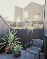 A rear roof terrace extends the space outdoors. Oak joinery and Farrow &amp; Ball’s Linen Wash add warmth to the interior.