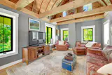 A separate wing serves as a private home office or flex space, with 16-and-a-half-foot vaulted ceilings.&nbsp; &nbsp;