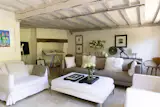 On the ground floor, the kitchen and dining room sit between the main living room and a separate reception room, with a pantry and utility room tucked alongside.