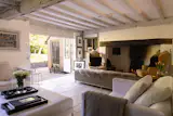 On the ground floor, the kitchen and dining room sit between the main living room and a separate reception room, with a pantry and utility room tucked alongside.