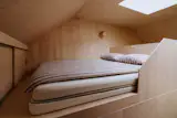 One of the sleeping areas has a skylight with an operable screen.