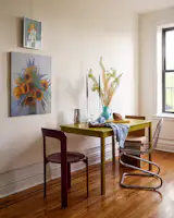 Catherine decorated her walls with pieces by George Grammer, a painter who lived and worked in New York. He studied at Parsons with Catherine’s mother in the 1970s, and lived in the city until he passed a few years ago.
