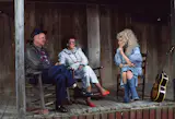 Dolly photographed at Dollywood with her father, Robert, and mother, Avie, in 1987.