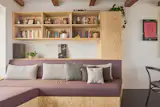 Zuzana and Tomas invested in built-ins, like the seating and shelving in the living space.