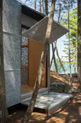 Matt and project architect Cory Papadopoli of Elliott Architects built a square foundation for the cube that they moved around until they found the right position in the woods.