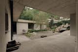 Near Lake Como, This €690K Concrete House Makes the Most of Its Narrow Site