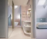 How They Pulled It Off: A Cramped Attic Becomes a Curvy, Pastel-Toned Primary Suite