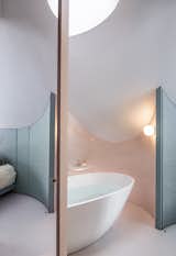 How They Pulled It Off: A Cramped Attic Becomes a Curvy, Pastel-Toned Primary Suite