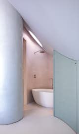How They Pulled It Off: A Cramped Attic Becomes a Curvy, Pastel-Toned Primary Suite