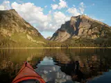 A quiet morning paddle across still waters to the far shore. Turns out the shore was not as close as it looked. Jackson Lake kayaking.
