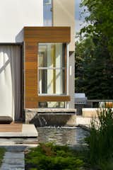 A water feature allows the patio and garden to float lightly.  
