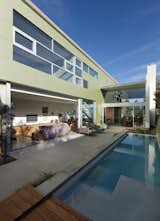 The division between the solid and transparent wings of the structure are clearly visible from the patio. 